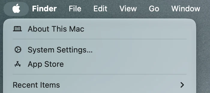 The Apple menu, open, with System Settings near the top.